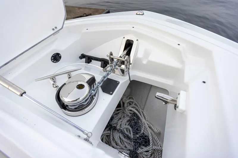 Slide: The Image of The anchor locker of a Blackfin 252 CC boat with anchor, chain, and ropes. - 13