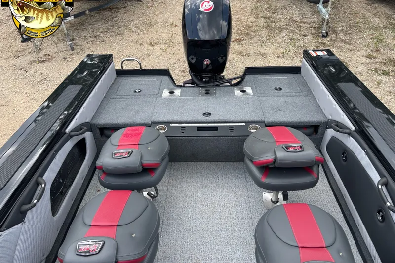 Slide: The Image of 2023 Ranger VX1788 WT boat interior with red and gray seating, motor, and storage compartments. - 9