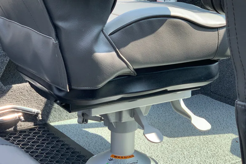 Slide: The Image of Boat seat in a 2025 Lund 2075 Impact XS, featuring a sturdy pedestal base. - 28
