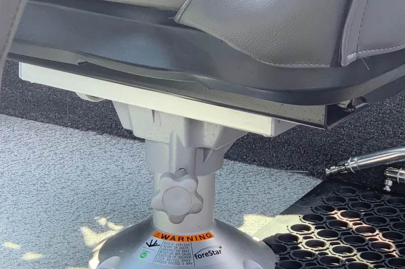 Slide: The Image of Boat seat base in a 2025 Lund 2075 Impact XS, featuring a sturdy pedestal design. - 29