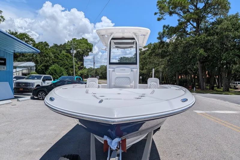 Slide: The Image of 2027 Caymas 26 HB boat displayed outdoors, showcasing sleek design and modern features. - 3