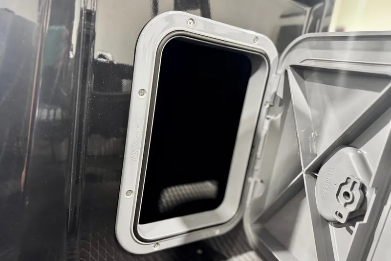Slide: The Image of Open hatch on a 2026 Highfield Patrol 540 boat, showcasing interior details. - 14