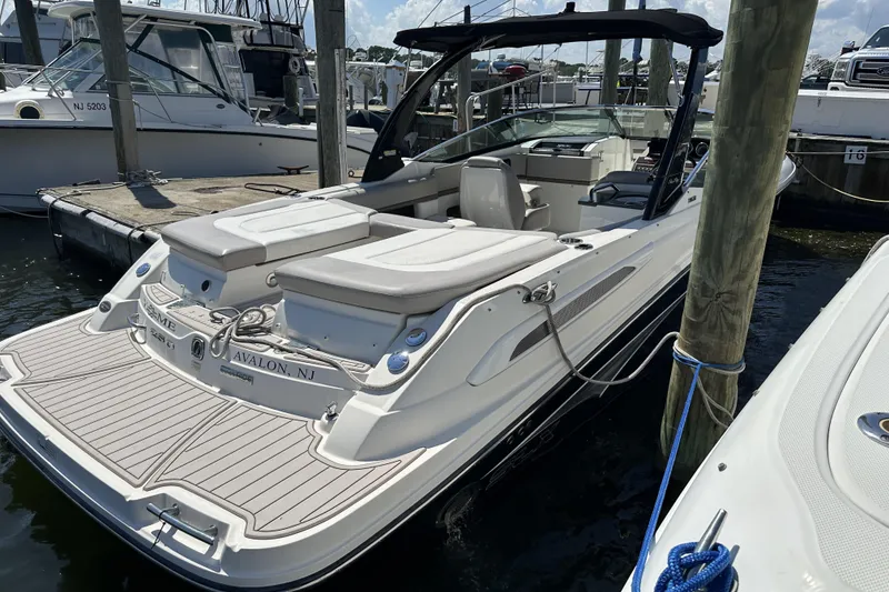 Slide: The Image of 2012 Sea Ray SLX 250 boat docked in Avalon, NJ marina. - 1