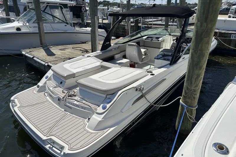 Slide: The Image of 2012 Sea Ray SLX 250 boat docked at marina in Avalon, NJ. - 16