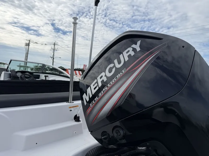Slide: The Image of A Mercury FourStroke outboard motor on a Four Winns HD 200 Freedom boat. - 8