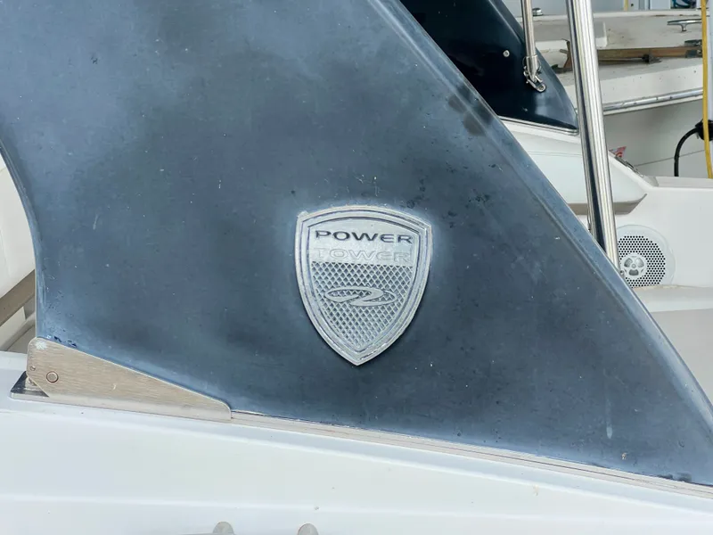 Slide: The Image of Close-up of a Regal 26 Express boat part with Power Tower logo. - 21