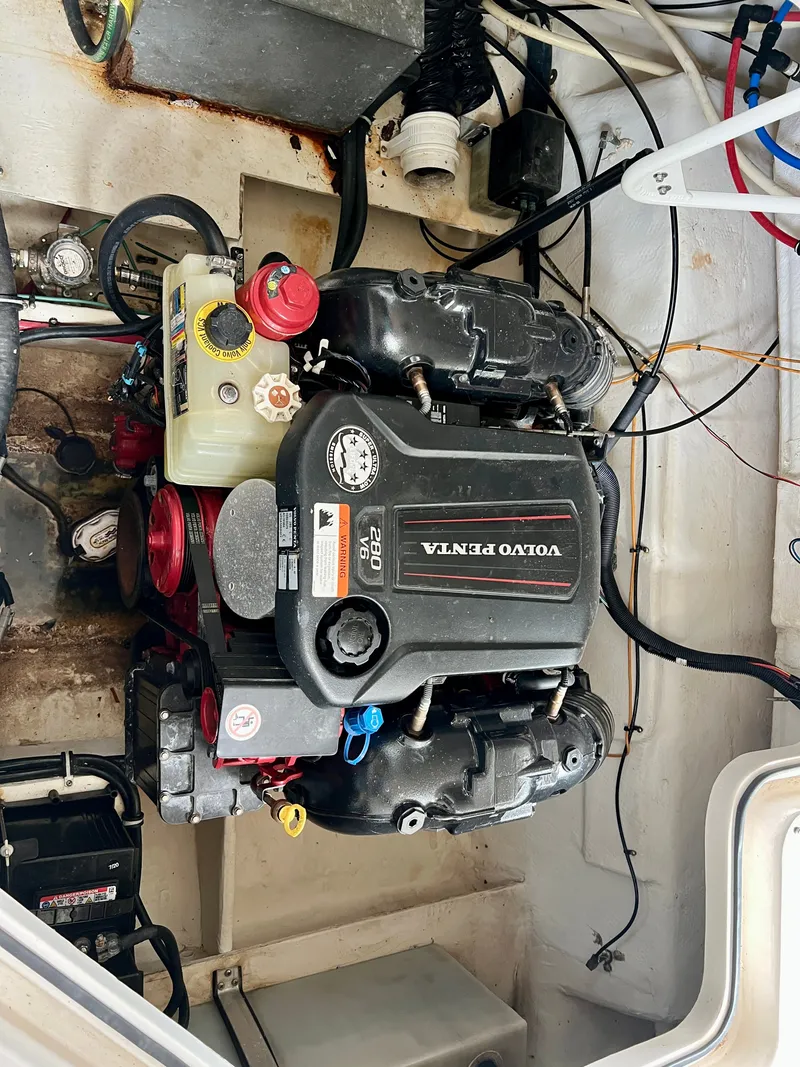 Slide: The Image of A Volvo Penta engine in a 2017 Regal 26 Express boat. - 22