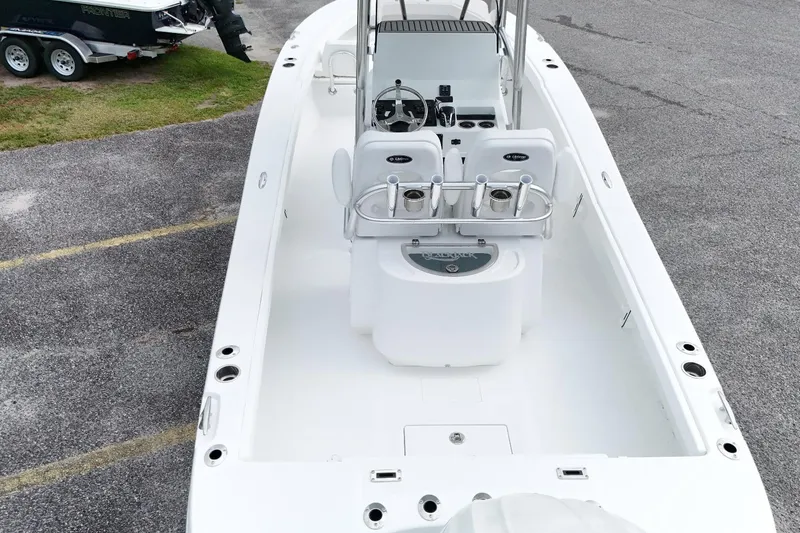 Slide: The Image of 2027 BlackJack 256 Coastal boat with sleek white interior and modern console design. - 6
