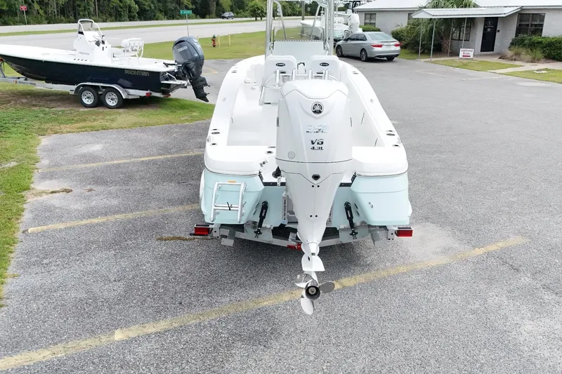 Slide: The Image of 2027 BlackJack 256 Coastal boat with Yamaha V6 engine in parking lot. - 10