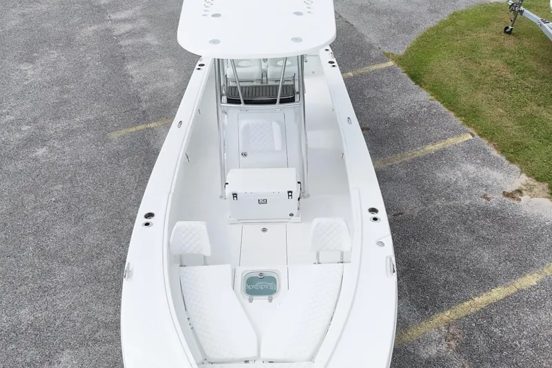 Slide: The Image of Aerial view of 2027 BlackJack 256 Coastal boat on pavement. - 11