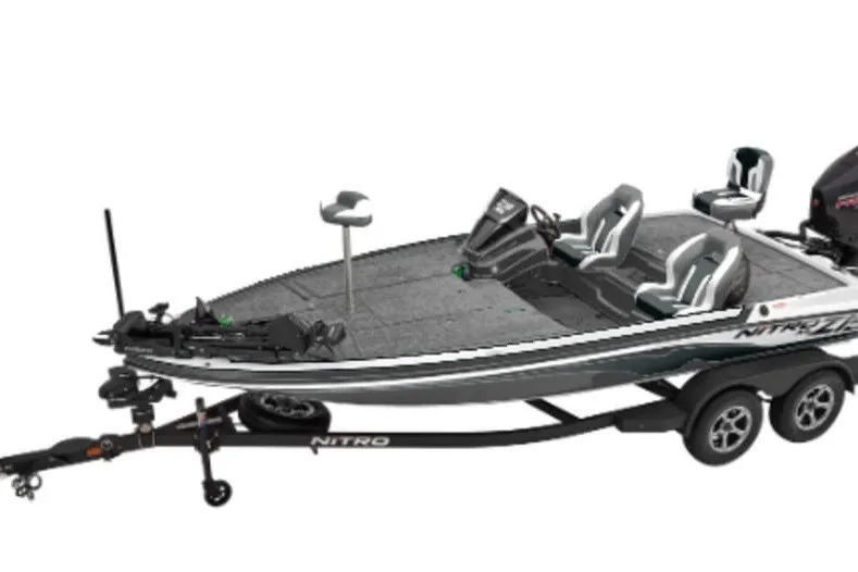 The Image of 2027 Nitro Z18 Pro fishing boat on trailer, featuring sleek design and dual seating. - 1