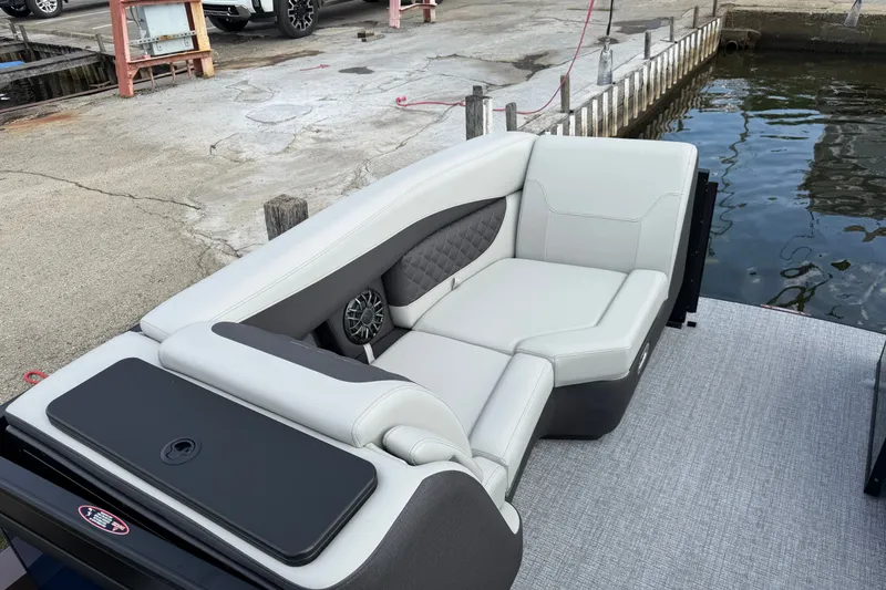 Slide: The Image of Luxurious seating on 2027 Harris Sunliner 210 pontoon boat at dockside. - 6