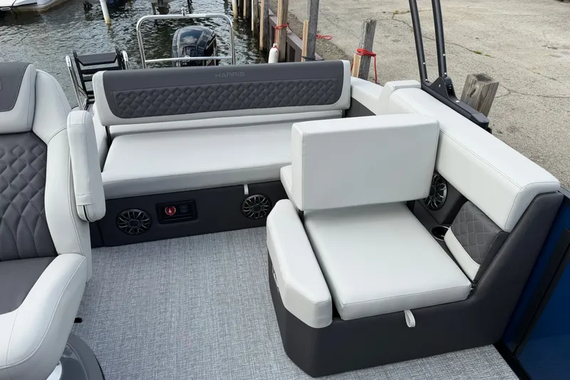 Slide: The Image of Luxurious seating on a 2027 Harris Sunliner 210 pontoon boat, featuring elegant upholstery and modern design. - 2