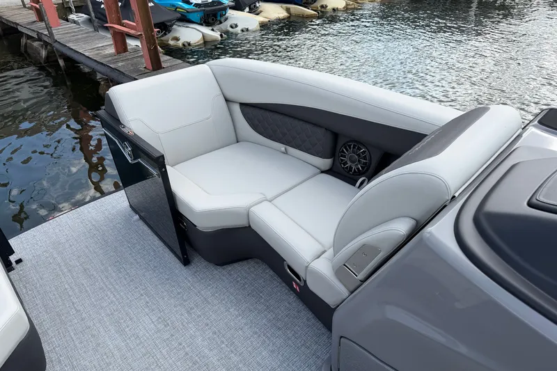 Slide: The Image of Luxurious seating on 2027 Harris Sunliner 210 pontoon boat by the dock. - 5