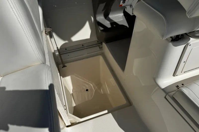 Slide: The Image of 2010 Robalo R265 Walkaround boat interior storage compartment. - 42