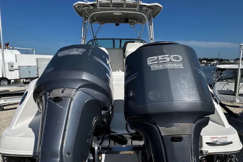 Slide: The Image of 2010 Robalo R265 Walkaround boat with twin 250 horsepower four-stroke engines. - 6