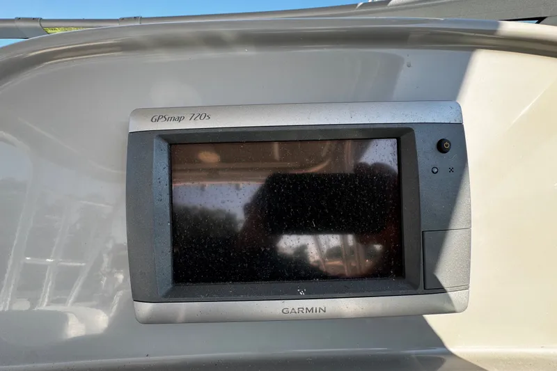 Slide: The Image of Garmin GPSmap 720s on 2010 Robalo R265 Walkaround boat dashboard. - 25