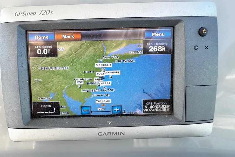 Slide: The Image of Garmin GPSmap 720s displaying navigation map on a 2010 Robalo R265 Walkaround boat. - 46