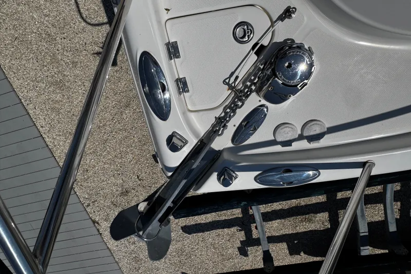 Slide: The Image of 2010 Robalo R265 Walkaround boat anchor and deck details. - 49