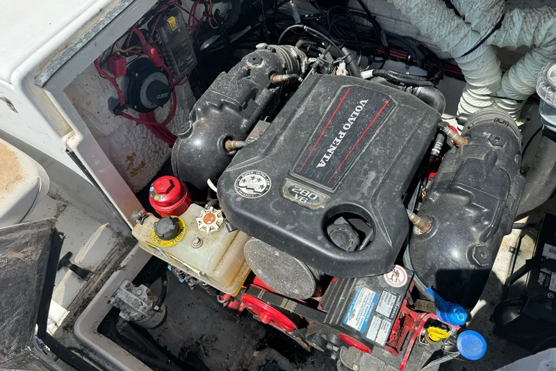 Slide: The Image of Engine compartment of a 2005 Seaswirl Striper 2301 Walkaround I/O with Volvo Penta 280 V6. - 22