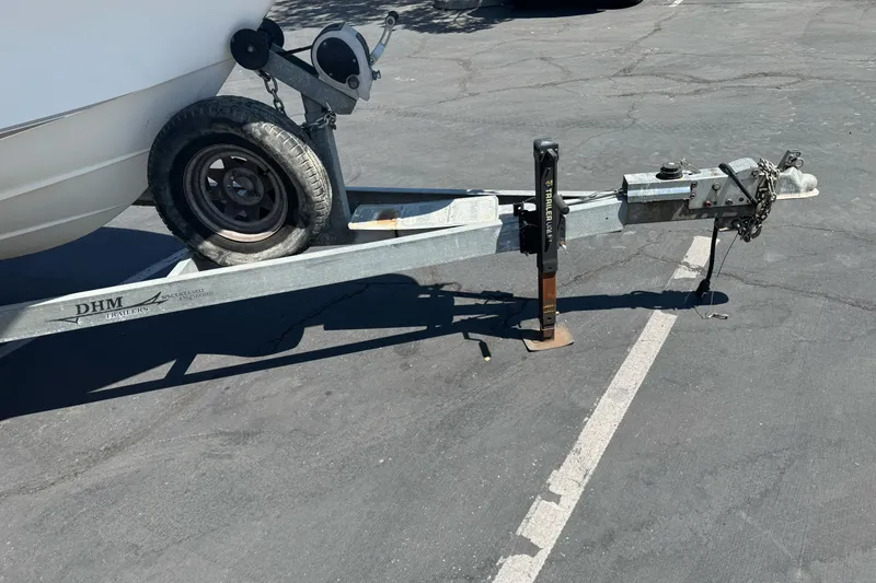 Slide: The Image of Trailer hitch of a 2005 Seaswirl Striper 2301 Walkaround I/O in a parking lot. - 4