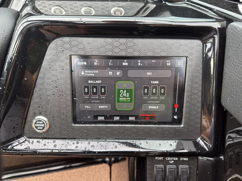 Slide: The Image of The dashboard of a MasterCraft NXT23 boat features a digital display with various controls. - 43