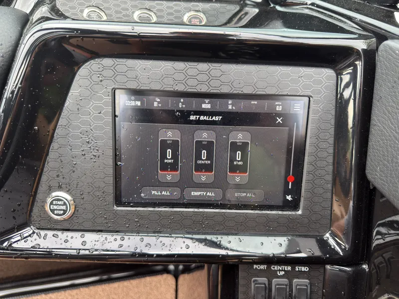 Slide: The Image of The image shows a control display of a MasterCraft NXT23 boat with ballast management. - 38