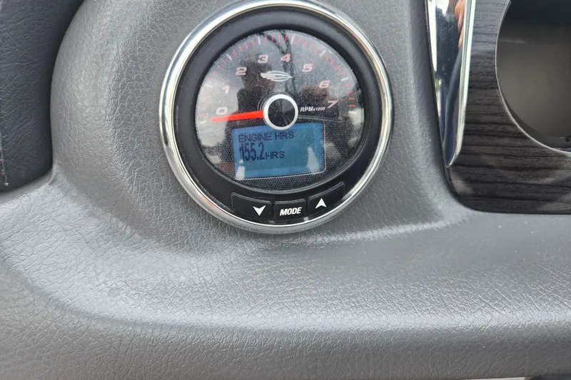 Slide: The Image of Dashboard gauge of 2017 Chaparral 246 SSi showing 155.2 engine hours. - 15