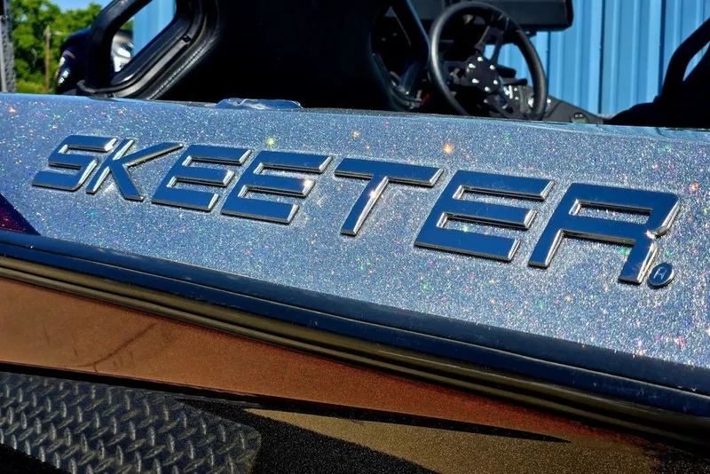 Slide: The Image of 2026 Skeeter ZXR21 boat with glittery finish and bold logo. - 5