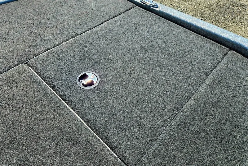 Slide: The Image of Carpeted deck of 2026 Skeeter ZXR21 boat with metal latch. - 36
