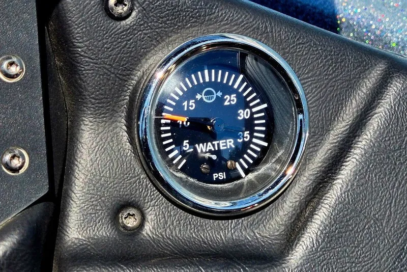Slide: The Image of Water pressure gauge on 2026 Skeeter ZXR21 dashboard, showing PSI readings. - 26