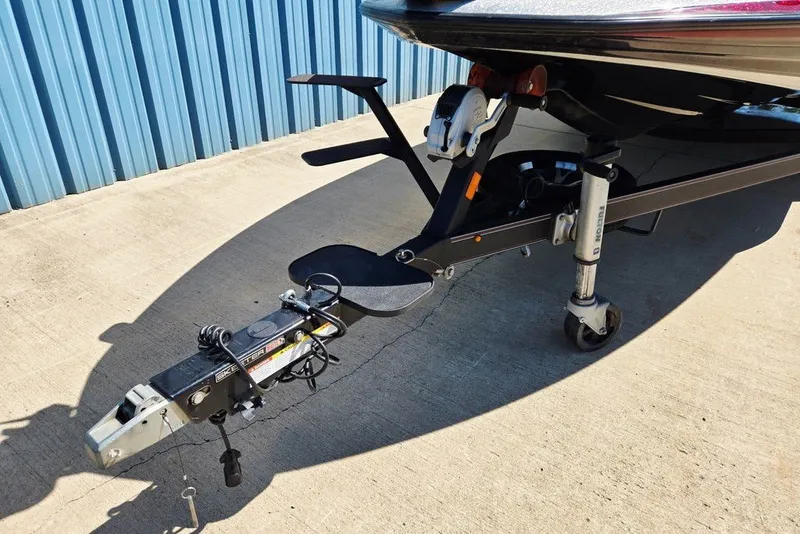 Slide: The Image of Trailer hitch of 2026 Skeeter ZXR21 boat on concrete surface. - 44