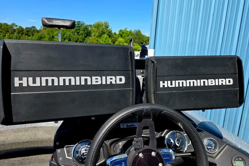 Slide: The Image of Dashboard of a 2026 Skeeter ZXR21 boat with dual Humminbird displays. - 23