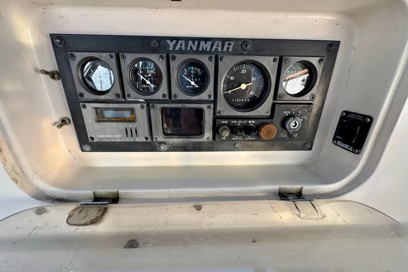 Slide: The Image of Control panel of a 1988 Hans Christian Christina boat with Yanmar engine gauges. - 29