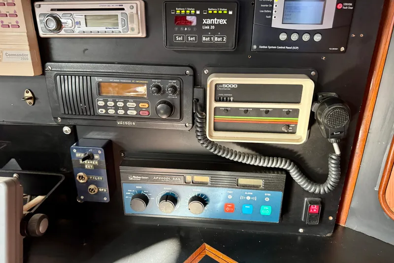 Slide: The Image of Control panel of a 1988 Hans Christian Christina boat with navigation and communication equipment. - 13