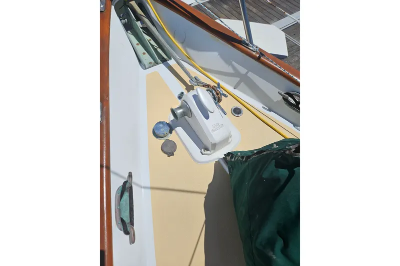 Slide: The Image of Deck view of 1988 Hans Christian Christina sailboat with winch and green cover. - 38
