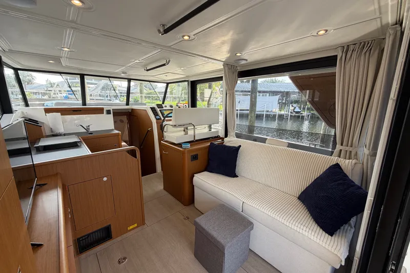 Slide: The Image of Interior of 2025 Beneteau Swift Trawler 35, featuring modern design and comfortable seating. - 22