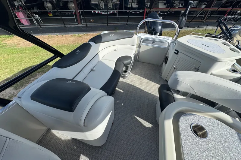 Slide: The Image of 2020 Avalon Catalina Platinum Entertainer 25' boat interior with luxurious seating and modern amenities. - 6