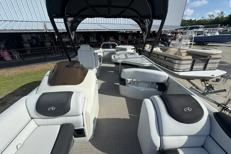 Slide: The Image of 2020 Avalon Catalina Platinum Entertainer 25' pontoon boat interior with luxurious seating. - 3