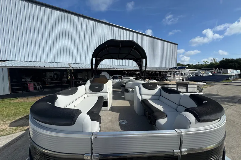 Slide: The Image of 2020 Avalon Catalina Platinum Entertainer 25' pontoon boat with luxurious seating and canopy. - 2