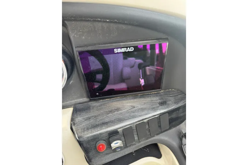 Slide: The Image of Dashboard of 2020 Avalon Catalina Platinum Entertainer with Simrad display. - 14