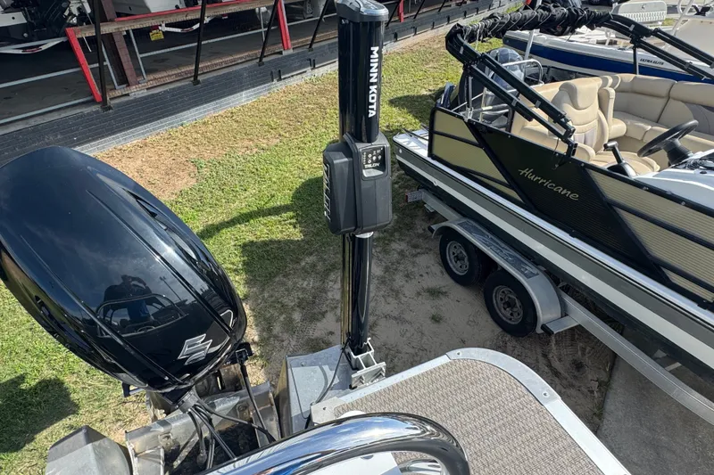 Slide: The Image of 2020 Avalon Catalina Platinum Entertainer boat with Suzuki engine and Minn Kota trolling motor. - 9