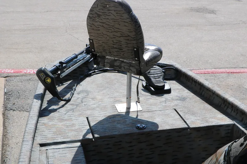 Slide: The Image of 2015 Xpress XP170 boat deck with seat and trolling motor. - 14