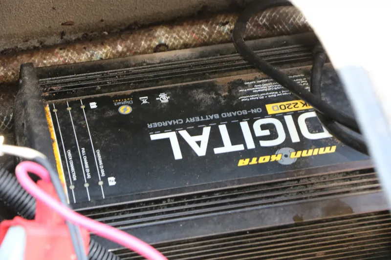 Slide: The Image of Minn Kota digital on-board battery charger in Xpress XP170, 2015 model. - 30
