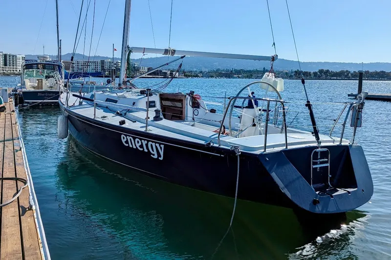 The Image of 2000 J Boats J/105 sailboat named "Energy" docked in a marina. - 3