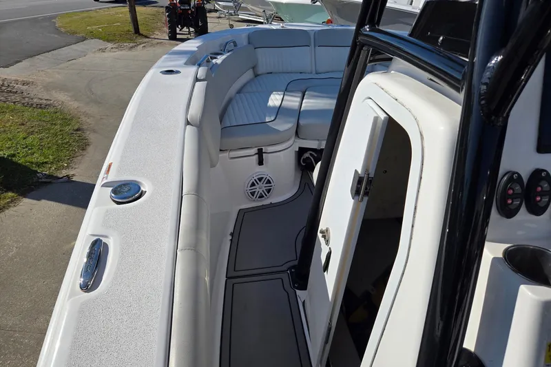 Slide: The Image of 2023 Sea Fox 248 Commander boat interior with seating and storage compartments. - 19