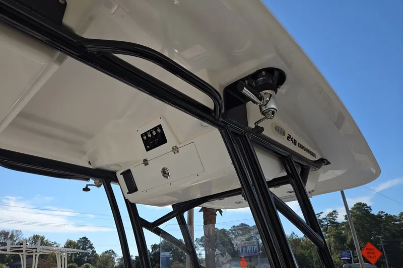 Slide: The Image of 2023 Sea Fox 248 Commander boat T-top with black frame and control panel. - 29