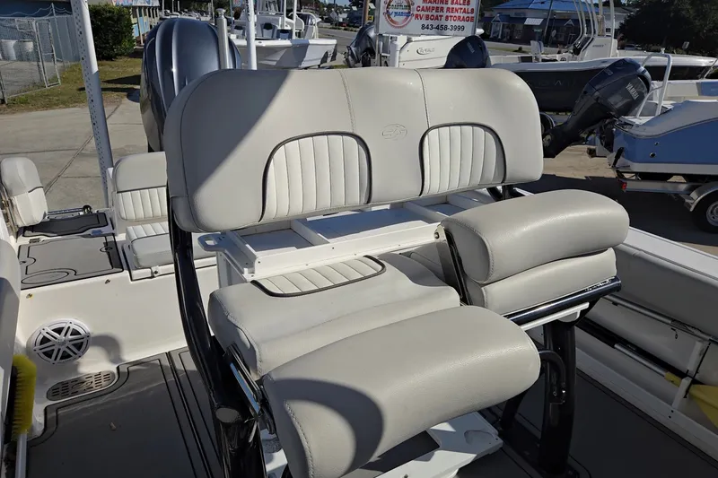 Slide: The Image of 2023 Sea Fox 248 Commander boat interior with cushioned seating and storage compartments. - 27