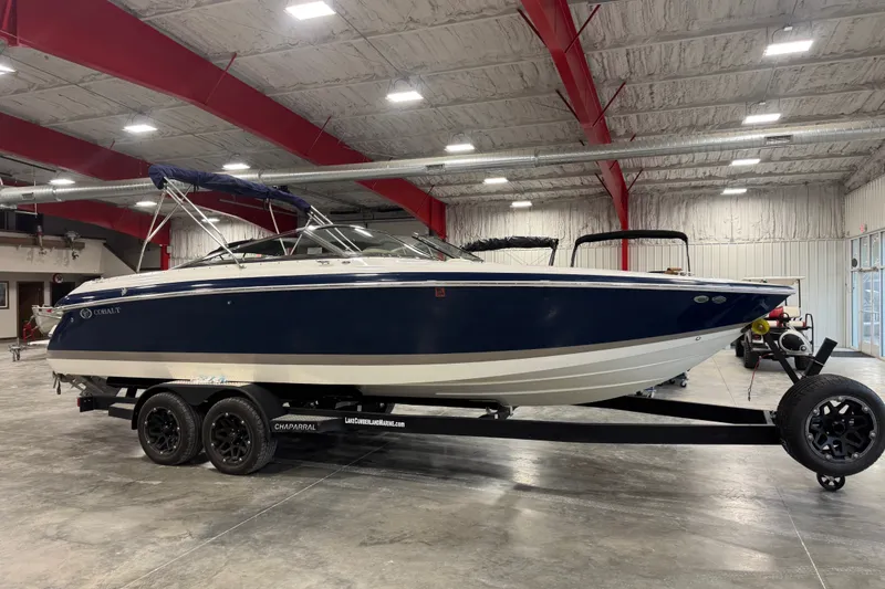 The Image of 2006 Cobalt 262 boat on trailer in indoor storage facility. - 1