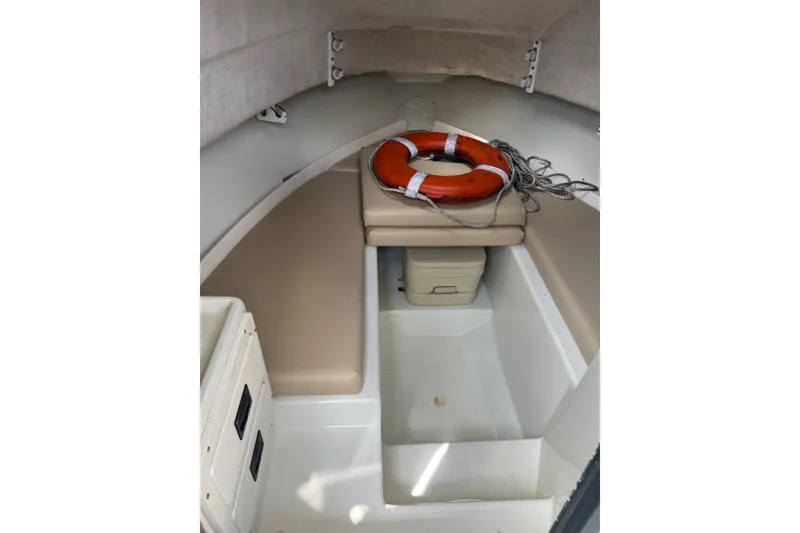 Slide: The Image of Interior cabin of 2000 Hydra-Sports 230 Seahorse WA with life preserver and storage. - 19